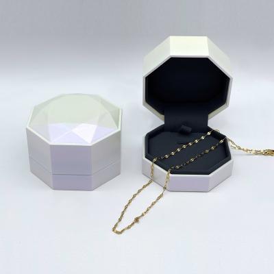 China High-end Luxury Octagonal Custom Pendant Gift Box Wedding Jewelry Ring Plastic+varnishing Painting Portable Jewelry Box for sale