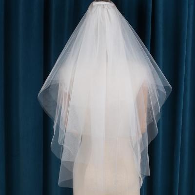 China Simple Bright Pearl Edge Elegent Wedding Veils Bridal Veils White Bridal Accessories Tulle Four-Layers With Comb for sale