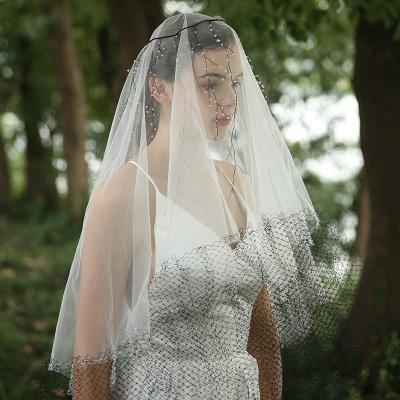 China Elegant Wedding Veil Crystal Headdress Bridal Veils Long Cut Edge Handmade Veil for sale