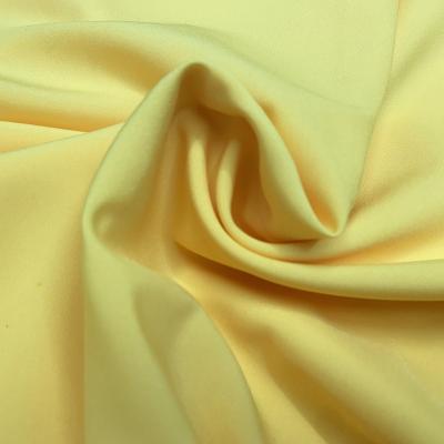 China Hot sale factory 100% textile polyester 4 way stretch fabric waterproof plain dyed fabric for textile for sale