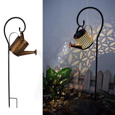 China New Garden Art Watering Can Light Crackle Metal Art Metal Yard Decoration Stake Waterproof Solar Led Solar Light for sale