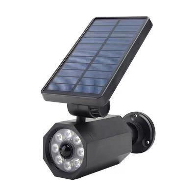 China Dummy Solar Waterproof Solar Light Solar Landscape Light Adjustable Automatic On/Off Wall Camera 8 LED Wall Security Lighting For Garden for sale