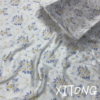 China Wrinkle resistant xitong textile woven polyester fabric 100% crepe chiffon fabric printing chiffon jacquard fabrics for apparel dress clothes for sale