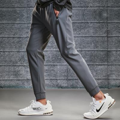 China Breathable Spandex Breathable Sportswear 80%Nylon 20% dyr Men Sports Gym Running Jogger Pants Custom Logo Men Sweatpants for sale