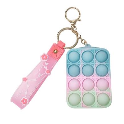 China Small Silicone Key Chain Key Chain Toy Relaxation Toy Busty Person Bag Storage Charm Toy Creative Colorful Small Gift Game for sale