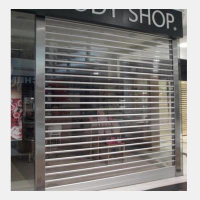 China Guangzhou Modern Transparent PC Grill Security Rolling Doors For Shop Front for sale