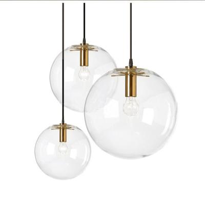 China Simple modern new design glass ball post modern creative pendant light for living room for sale