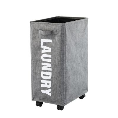 China Traditional Large Fabrics Laundry Storage Hardware Basket With Wheels For Dirty Clothes Cleaning for sale