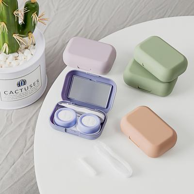 China Compact and simple portable contact lens cases boxes frosted lacquer colored contact lens case with mirror eye care contact lens container cosmetic contact lens case box for sale