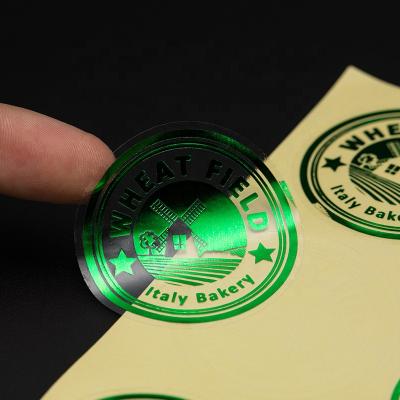 China Anti-Counterfeit Wholesale Custom Logo Sticker Label Clear Self Adhesive Golden Self Adhesive Sticker for sale