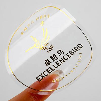 China Anti-counterfeit transparent round label PVC sticker logo sticker hot stamping custom waterproof label printing for sale