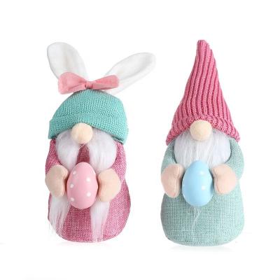 China Easter Decoration Ornaments Newcomer Cute Knitted Hat Egg Holding Easter Home Decor Rudolph Children Holiday Gift Toy for sale