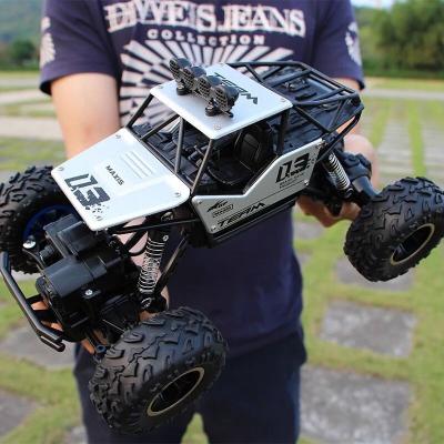 China Rc Cars Four Channel Remote Control Off-Road Alloy Plastic Car Charging Bigfoot High-speed Rising Racing Kids Toys ZYT-PH-WJ009 for sale