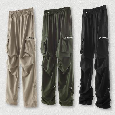 China QUICK DRY Nylon Parachute Cargo Pants Y2K Straight Pants Comfy Streetwear Wide Leg Pants Women Snow Mens Custom Loose Loose Pants Baggy for sale