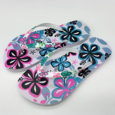 China Newest Custom Movie Sweat-absorbent Print Flower Upper Rubber Slipper Wholesale And Cheap Beach Flip Flops For Girls for sale