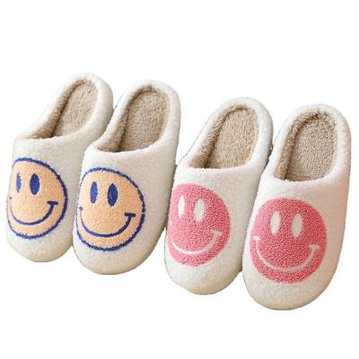 China Durable Smiley Face Slippers Autumn and Winter Couples Smile Slippers Women's Indoor Cute Cartoon Indoor Smiling Slippers for sale