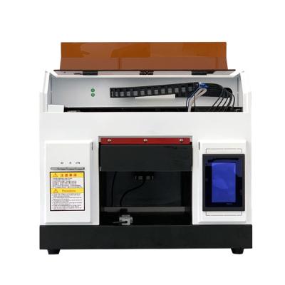 China Hotels 2021 hot uv a4 printer uv printer price mini uv machine a4 uv printer for sale