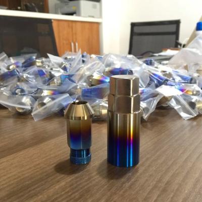 China Low Density Selling Hot Seven Race Car Key Parts Lug Nut M12 Titanium Wheel Nuts Bolts for sale