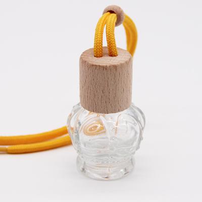 China Wholesale Cylindrical Wooden Car Perfume Bottle Personal Care Cap For Hanging Fresh Air In The Car for sale