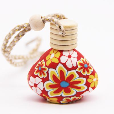 China Car Air Freshener 15ml Scented Custom Hanging Empty Car Glass Bottle Diffuser With Polymer Clay for sale