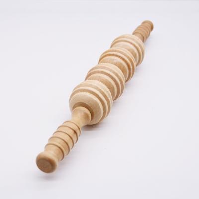 China Portable Full Body Muscle Therapy Wooden Massage Roller Stick With 4 Balls for sale