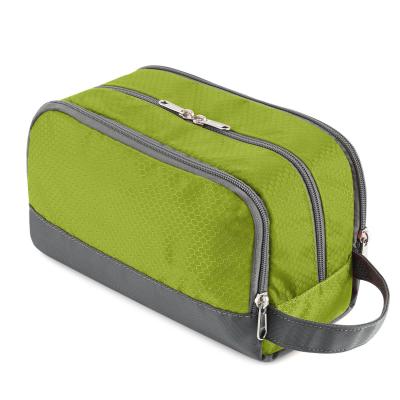 China 2021 hot sale green cosmetic bags for man and women women for sale