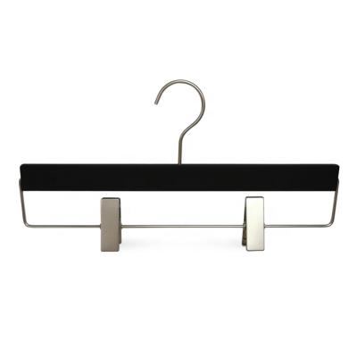 China CLASSIC Custom Made Black Wood Hanger With Metal Clips Printed Logo Fashion Brands Display for sale