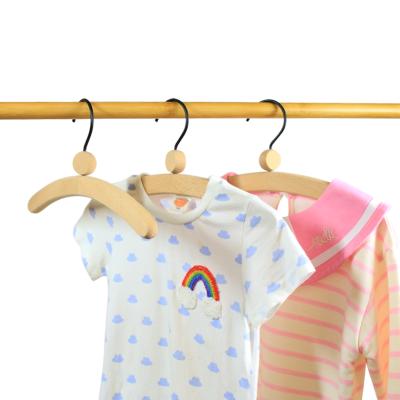 China Vintage High Quality Personalized Wooden Cloth Hangers for Kids, Children's Clothing Display for sale