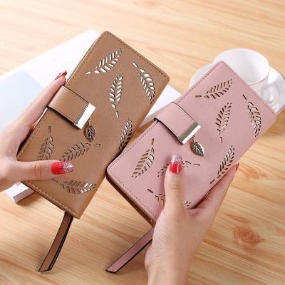 China New Fashion Waterproof Clutch Bag Hollowing Leaf Wallets Leather Lined Woman Long Zipper Wallet for sale