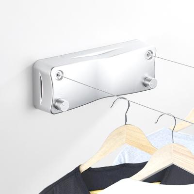 China Modern Household Balcony Retractable Hole Wall Hanger Hook Free Indoor Clothesline for sale