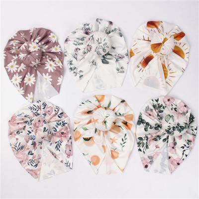 China Cozy Eco-Friendly Bamboo Hat Infant Rayon Elastic Head Wraps Infant Baby Girls Printed Donuts Hood Beanies Hats for sale