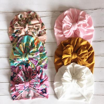 China Comfy Eco-Friendly Bow Turban Messy Hat for Infant Hospital Floral Top Hat Headband Babies Knot Hats for sale