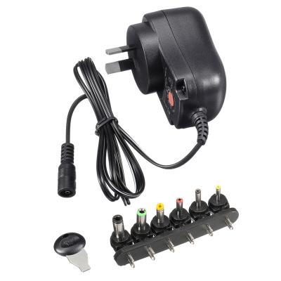 China UniversalÂ   3V-12V 12W/30W Adjustable Universal Power Supply Adapter Converter With Multiple DC - 12W Tips for sale