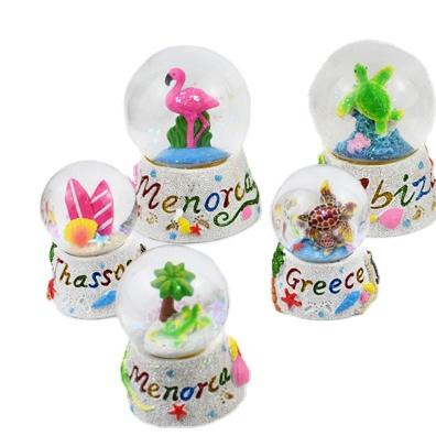 China Factory Supply Mini Snow Globes Resin Glass Tropical Water Balls Tourism Souvenirs for sale