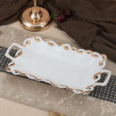 China Sustainable Wholesale Cheap Price Luxury Gold Tableware Porcelain Fruit Tray Ceramic Fruit Plate With Double Handle for sale