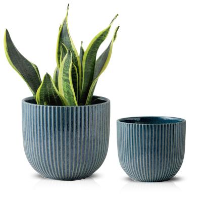 China Durable Simple Unique Ceramic Flower Pot Home Garden Wholesale Flower Pots for sale