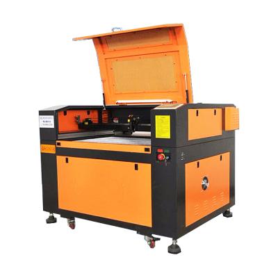 China Laser Engraving Orange All 50w 60w 80w 100w CO2 Laser Engraving Machine Clothing Laser Cutting Machine for Leather and Acrylic for sale