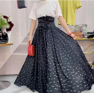 China Zeqing bujiaka fashion polyester casual women's breathable skirt elegant broken fiber long small flower skirt for sale