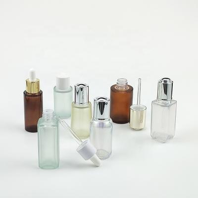 China 1oz cosmetic colorful plastic 30 dropper bottle 40 50ml empty essential oil container with rubber sleeve for sale