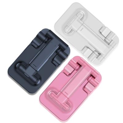 China Popular Unique Design Mobile Phone Holder Bracket Silver Plastic Universal Folding Adjustable for sale