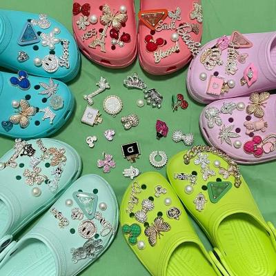 China 2023 bling custom designer shoe clog croc charm shoe charm for brand logo croc charm hold designer shoe luxury decoration for sale