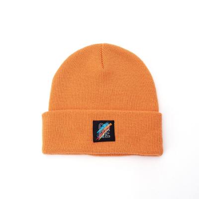 China COMMON Warm Label Beanies Hats Outdoor Acrylic Knitted Winter Hats With Custom Logo for sale