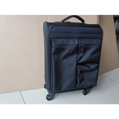 China Fashionable Handmade Metal Custom Logo Printed Waterproof Nylon Zipper Travel Luggage Bags With Trolley Wheels for sale