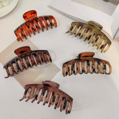 China Decorate fashion plastic succinite as claw acrylic amber bright face large acetate pan matte head hair clip for sale