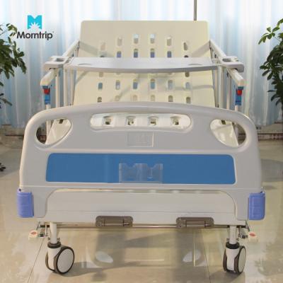 China ABS 2 Cranks ABS Head and Foot Board Free Used Portable Hospital Bed Manual Psychiatric Bed with IV Stand and Dining Table for sale