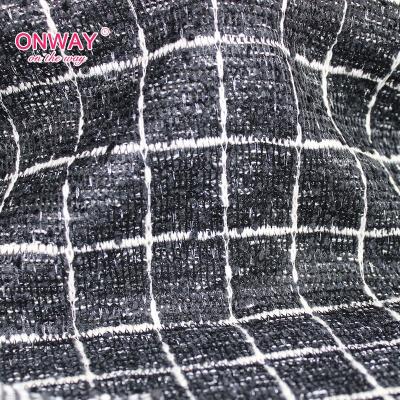 China Low MOQ Eco-friendly Sustainable Customized Black Yarn Dyed Flannel Jacquard Knitting Fabric For Beanie And Sweater Dress for sale