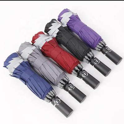 China Modern Portable 10 Ribs Inverted Umbrella 3 By 23 Inch Automatic Reverse Folding With Silver Reflective Brand Anti-wind Storm Umbrella for sale