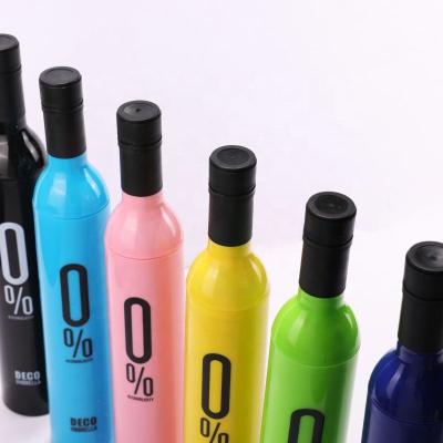 China Traditional Promotional Cheap Price Gifts Customized Logo Manual Open 3 Times UV Rainy Sunny Travel Wine Shape Bottle Umbrella With Logo for sale