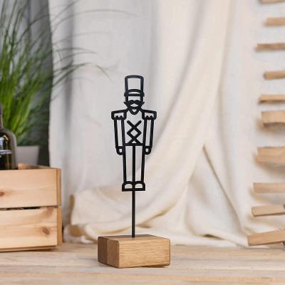 China Eclectic Nutcracker metal wooden stand  modern industrial decoration with wood and metal for sale