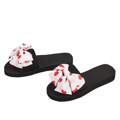 China Fashion trend hot seller women home slippers bowknot and EVA soft slippery outsole chanclas for women outdoor leisure pedicure slippers for sale